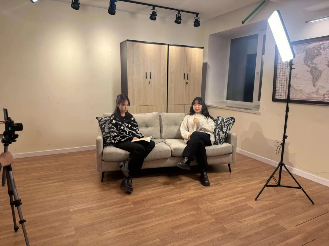 Two people in conversation during a filmed Youth Development Programme interview